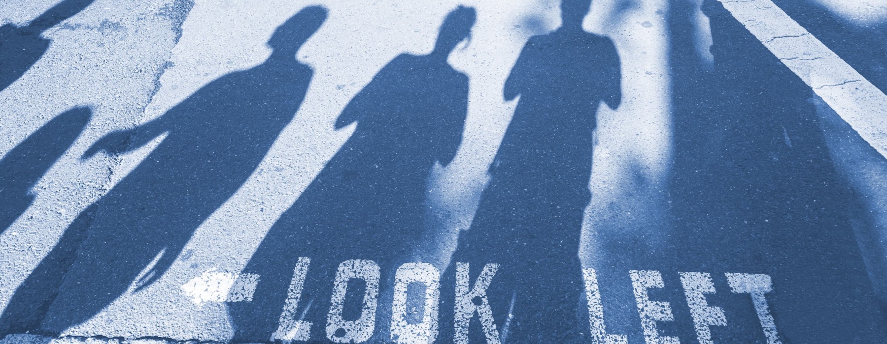 shadows on a crosswalk outdoors