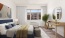 bedroom with ample space around the bed and bright lighting