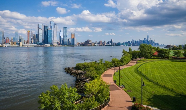 wide view of the city and nearby greenery
