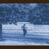 a person standing on a sidewalk