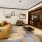 a spacious room with a large bookcase and a couch